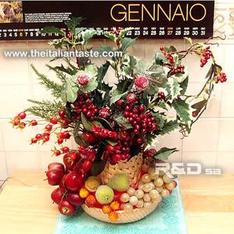 decorazione natalizia con luci led , frutta, bacche e fiori artificiali