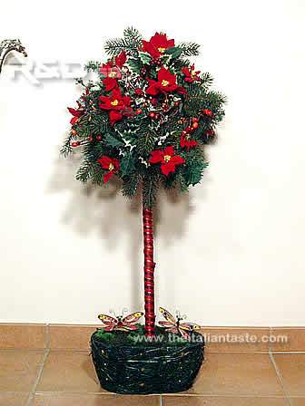 alberello di Natale di benvenuto realizzato con una spugna sferica montata su un bastone, l'alberello è inserito in un cestino e decorato con ornamenti natalizi e rametti vari