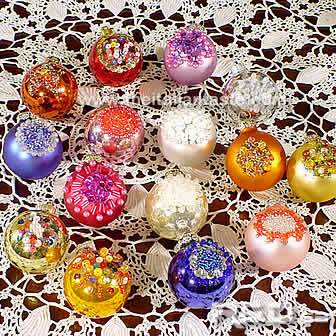 Hand decorated christmas balls with pearls, paellettes and beads