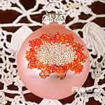 pink christmas ball decorated with beads