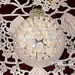pallina gioiello argento con decorazioni bianche