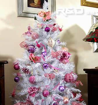 Pink ornaments for a white Christmas pine