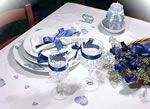 the whole blue table for valentine's day set up with red or blue hearts