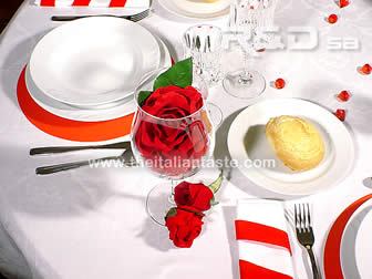 a valentine's day table with red decorations