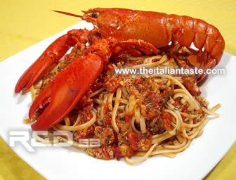 lobster linguini in a white plate