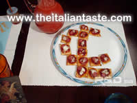 little pizzas arranged according to the initials of the lovers; a perfect dish for valentines menu