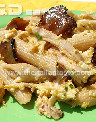pasta salad with truffle and rabbit for special occasion menu, the photo shows a detailwith pasta combined with truffle slices and rabbit meat 