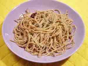 spaghetti recipe, the photo shows spaghetti tossed with caper and anchovy sauce