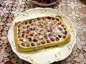 Cherry clafoutis in a serving platter