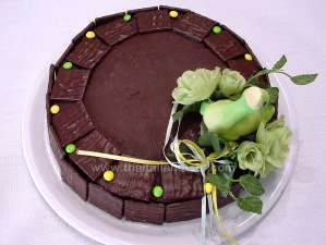 sacher torte garnished with chocolate biscuits