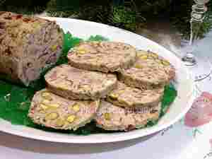 Chicken galantine, Italian recipe made with chicken and veal meat, ham and other salami, pistachios, black truffles