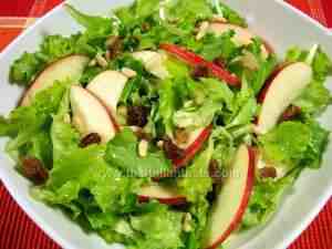 Lettuce with apples, sultanas and pine nuts
