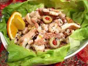 Seafood salad made with octopus, squids, clams and shrimps