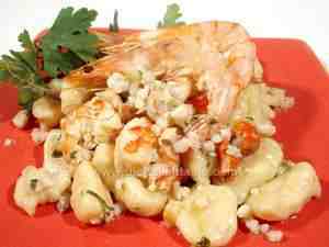 Gnocchi with scallop-and-prawn sauce , a tasty seafood dish