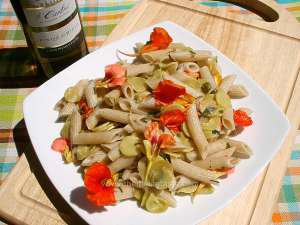 Italian pasta with zucchini and nasturtiums
