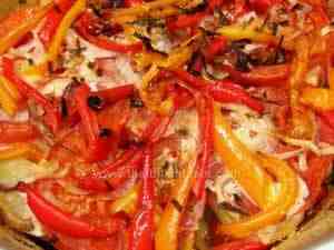 Vegetable pie with potatoes, tomatoes, bell peppers and onion
