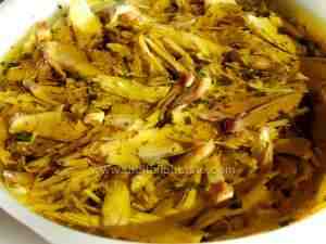 Boiled capon in olive oil