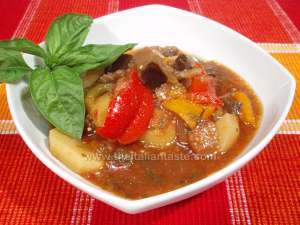 Minestrone of Apulia also called dauno, the photo shows a bowl full of minestrone whose main ingredients are sweet peppers, aubergines, potatoes and tomatoes