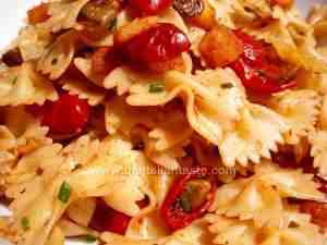 pasta salad with stoned olives, croutons, tomato confit and dried fruit