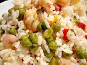 italian rice salad with prawns, peas and peppers
