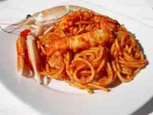 spaghetti tossed with shrimp scampi sauce