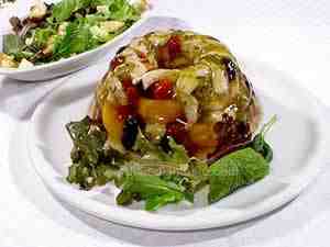 Turkey aspic in platter with green salad