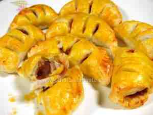 Puff pastry appetizers stuffed with baby octopus