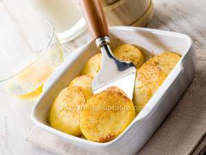 baked semolina gnocchi in an ovenproof dish