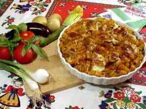 Italian baked pasta with vegetables and mozzarella cheese