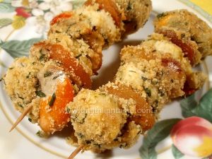 Capesante gratinate con frutta secca