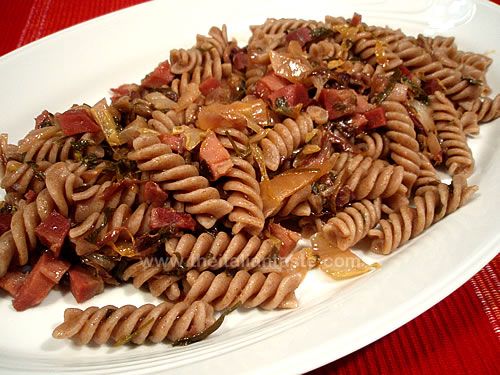 Italian pasta dishes with radicchio and speck