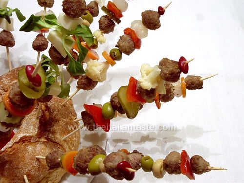 Little meatballs and vegetables on skewers