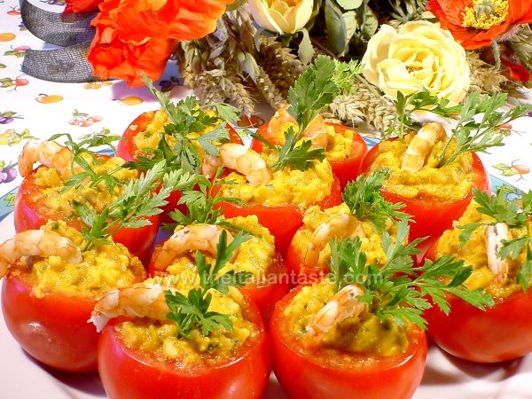 Tomatoes filled with fish and lentils