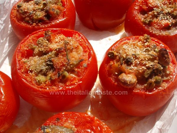 Tomatoes filled with assorted vegetables