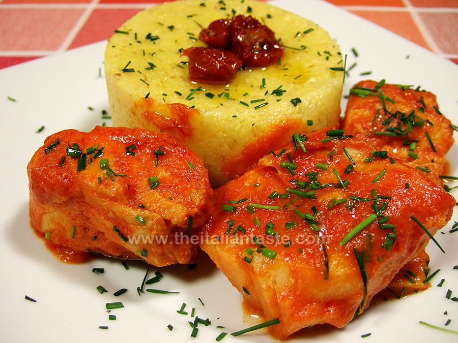Polenta topped with stewed salt cod
