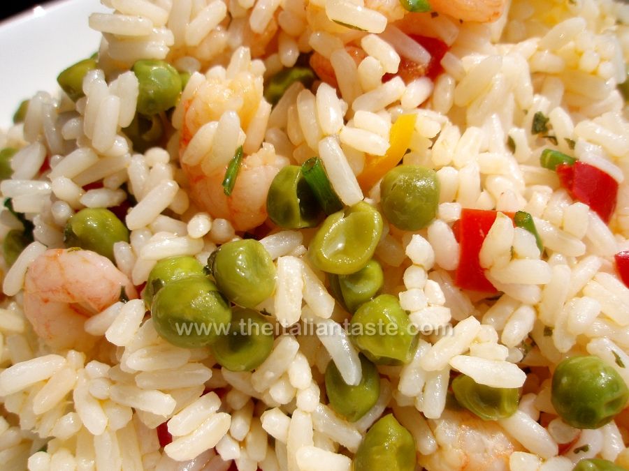 Rice salad with shrimps, peas and bell peppers
